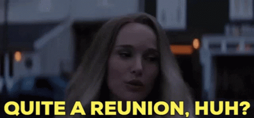A Woman Says Quite A Reunion Huh In A Dark Room GIF