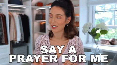A Woman Says " Say A Prayer For Me " In A Closet GIF