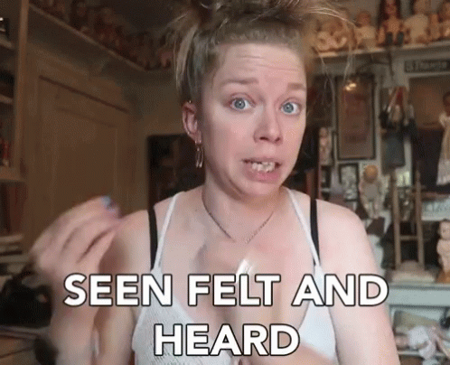 A Woman Says Seen Felt And Heard In Front Of Dolls GIF