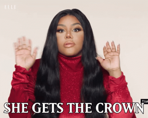 A Woman Says She Gets The Crown In A Red Sweater GIF