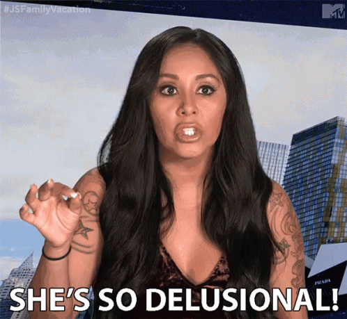 A Woman Says She 'S So Delusional In Front Of A Building GIF
