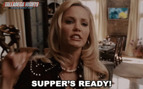 a woman says " supper 's ready " in front of a sign for talladega nights