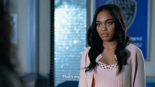 A Woman Says That 'S My Dress In Front Of A Police Badge GIF