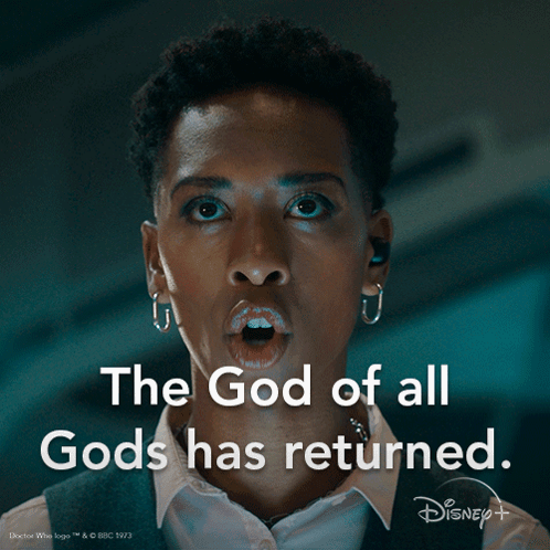 A Woman Says " The God Of All Gods Has Returned " In A Dark Room GIF