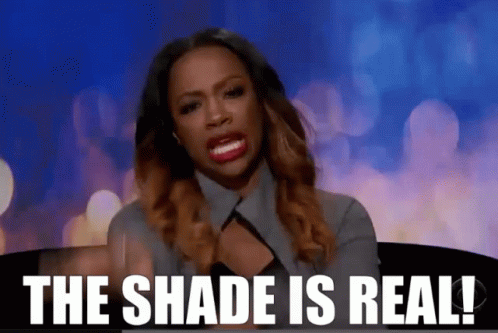 A Woman Says The Shade Is Real While Making A Funny Face GIF
