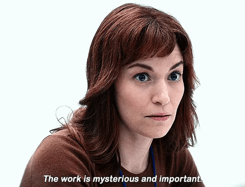 A Woman Says " The Work Is Mysterious And Important " In Front Of A White Background GIF