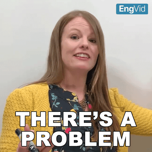A Woman Says There 'S A Problem In Front Of A White Board GIF