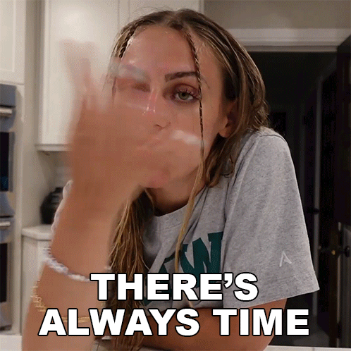 A Woman Says There 'S Always Time While Holding A Glass GIF