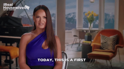 A Woman Says Today This Is A First In Front Of A Real Housewives Logo GIF