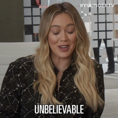 A Woman Says " Unbelievable " In Front Of A Youngertv Logo GIF