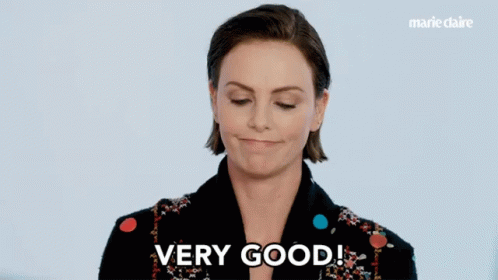 A Woman Says " Very Good " In Front Of A Marie Claire Ad GIF
