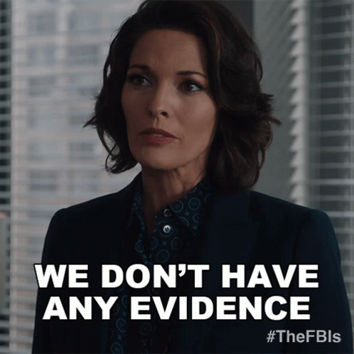 A Woman Says " We Don 'T Have Any Evidence " In Front Of A Window GIF