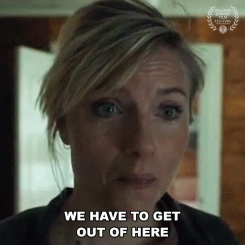 Woman Saying We Have To Get Out Of Here GIF