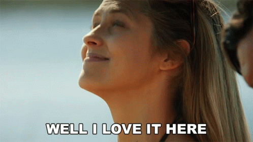 A Woman Says Well I Love It Here In Front Of A Body Of Water GIF