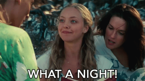 A Woman Says " What A Night " While Talking To Two Other Women GIF