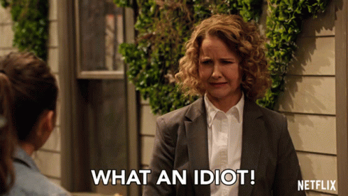 A Woman Says What An Idiot In Front Of A Netflix Ad GIF