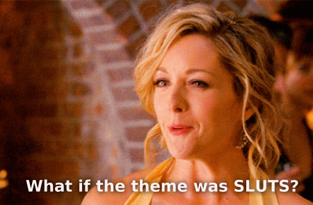 A Woman Says What If The Theme Was Sluts In Front Of A Brick Wall GIF