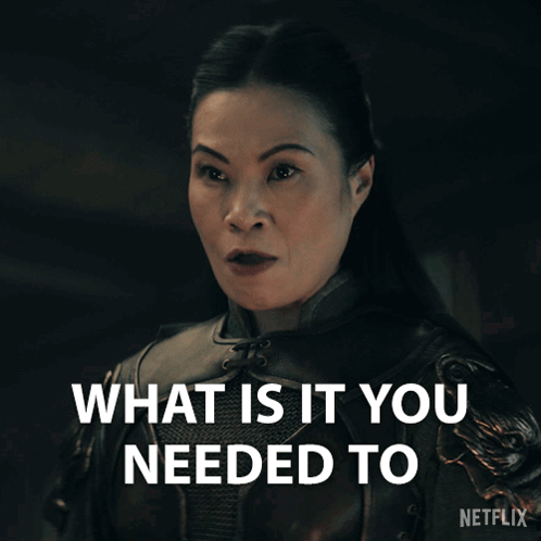 A Woman Says What Is It You Needed To In A Dark Room GIF