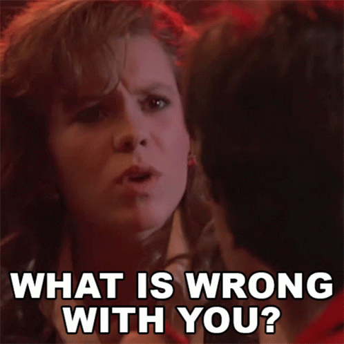 A Woman Says " What Is Wrong With You " While Looking At The Camera GIF