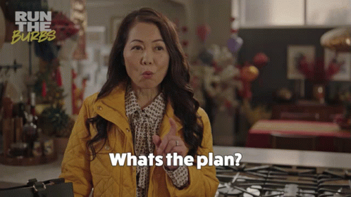A Woman Says What 'S The Plan In Front Of A Sign That Says Run The Burbs GIF