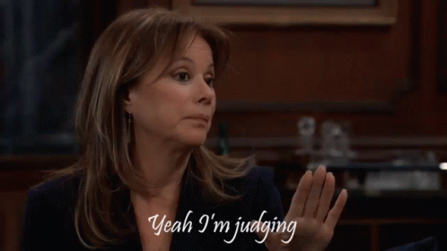 A Woman Says " Yeah I 'M Judging " With Her Hands Outstretched GIF