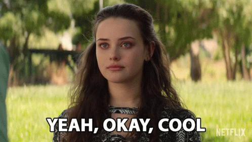 A Woman Says " Yeah Okay Cool " In Front Of A Green Field GIF