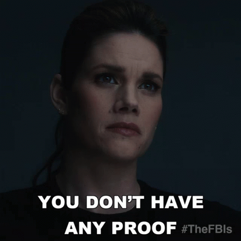 A Woman Says " You Don 'T Have Any Proof " In Front Of A Dark Background GIF