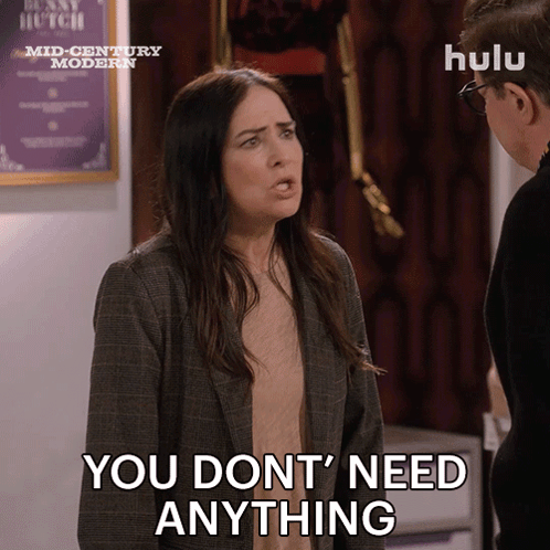 A Woman Says " You Don 'T Need Anything " In Front Of A Man GIF