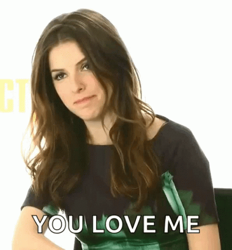 A Woman Says " You Love Me " In A Green Shirt GIF