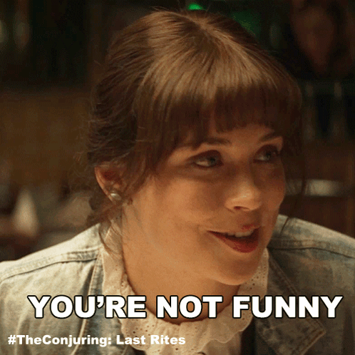 A Woman Says " You 'Re Not Funny " While Looking At Something GIF
