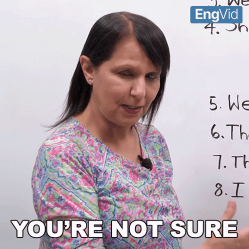 A Woman Says " You 'Re Not Sure " While Pointing At A White Board GIF