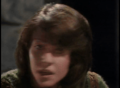 A Woman Says " You 'Re Serious Aren 'T You " In Yellow Letters GIF