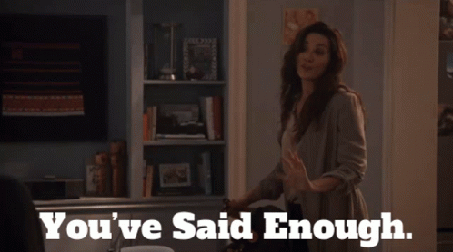 A Woman Says You 'Ve Said Enough While Standing In A Living Room GIF