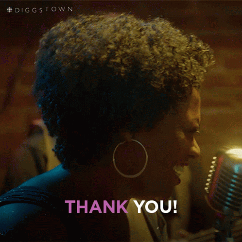 A Woman Singing In Front Of A Microphone With The Words Thank You Written Below Her GIF