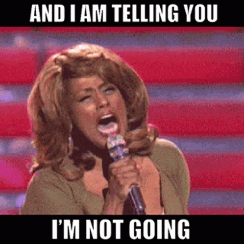 A Woman Singing Into A Microphone With The Words And I Am Telling You I 'M Not Going GIF