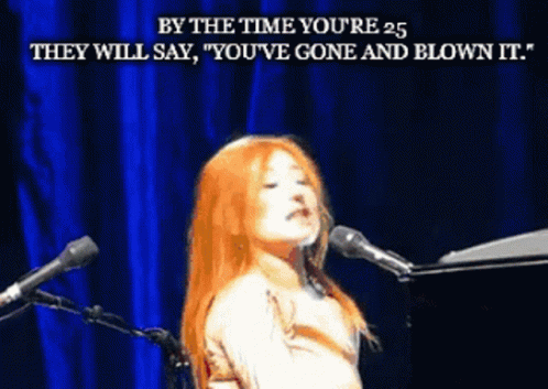 Woman Singing With By The Time You're 25 Text GIF