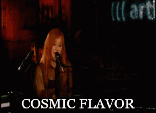 Woman Singing Into Microphone With Cosmic Flavor Text GIF