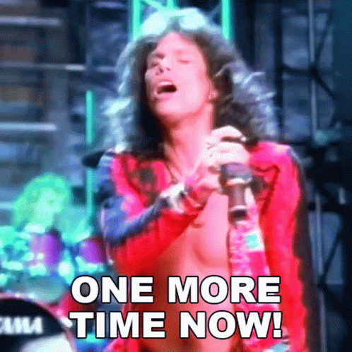 a woman singing into a microphone with the words " one more time now " below her