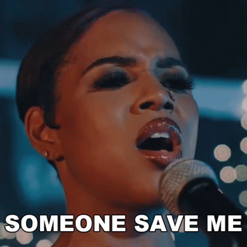 A Woman Singing Into A Microphone With The Words " Someone Save Me " Above Her GIF