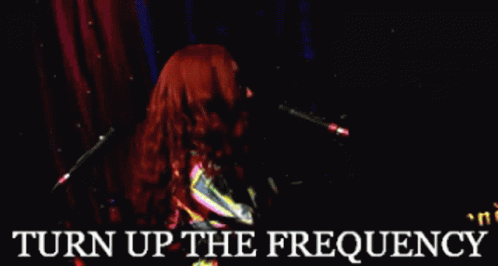 Woman Singing Into Microphone Turn Up Frequency GIF