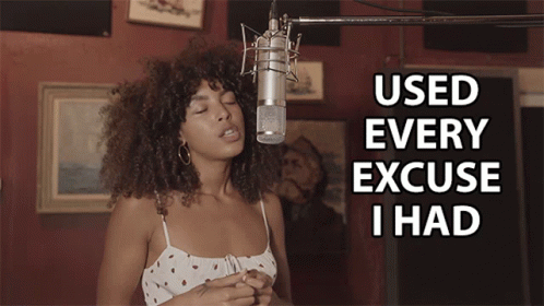 A Woman Singing Into A Microphone With The Words Used Every Excuse I Had Behind Her GIF