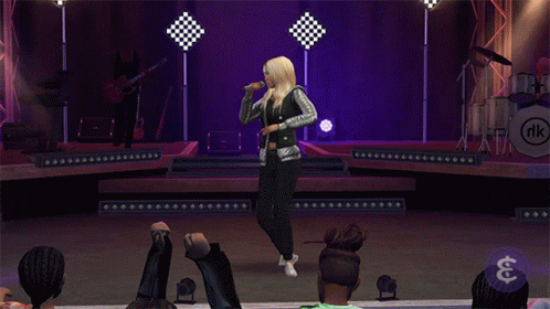 A Woman Singing On A Stage With A Band Behind Her And A Dollar Sign GIF