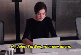 A Woman Sits At A Desk With A Laptop And Says " Hi Jules I 'M Ben Your New Intern " GIF
