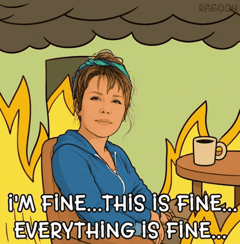 A Woman Sits At A Table With A Cup Of Coffee And Says I 'M Fine This Is Fine Everything Is Fine GIF