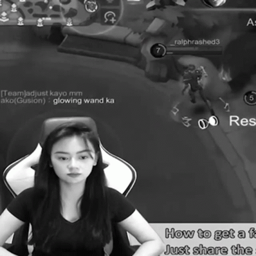A Woman Sits In A Chair In Front Of A Screen That Says " How To Get A F " GIF