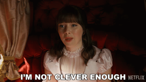 A Woman Sits In A Chair With The Words " I 'M Not Clever Enough " Written On The Bottom GIF