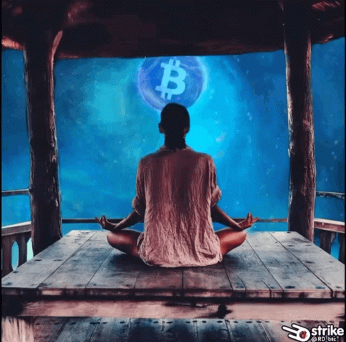 A Woman Sits In A Lotus Position In Front Of A Bitcoin Symbol GIF