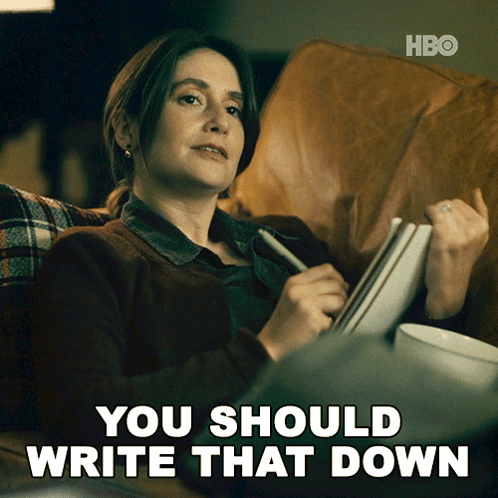 A Woman Sits On A Couch With A Pen In Her Hand And The Words " You Should Write That Down " Next To Her GIF