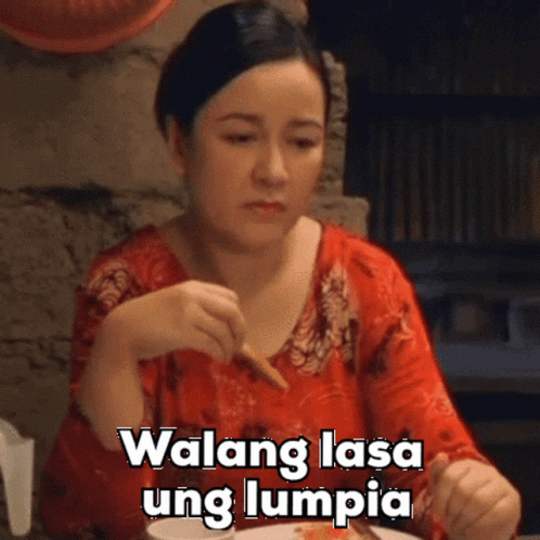 A Woman Sitting At A Table With A Plate Of Food And The Words Walang Lasa Ung Lumpia GIF