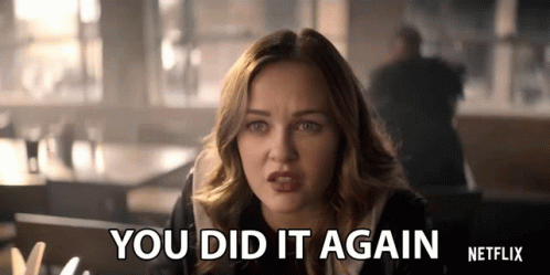 A Woman Sitting At A Table With The Words You Did It Again Netflix Written On The Bottom GIF